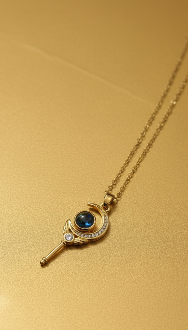 Celestial Moon & Star Wand Pendant Necklace – Gold Plated with Blue Stone Accent